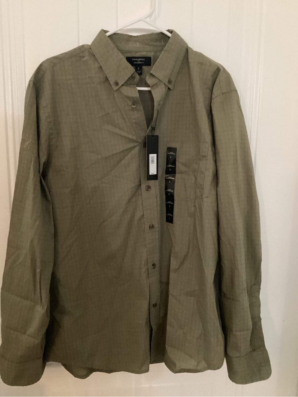 Olive green button-up shirt in size L #olive #buttonup #longsleeve
